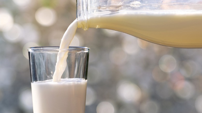 Pouring a glass of milk