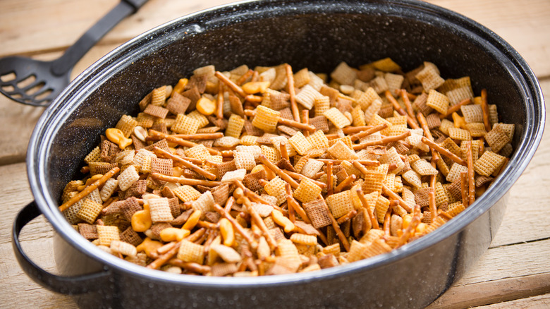 A pot filled with Chex Mix