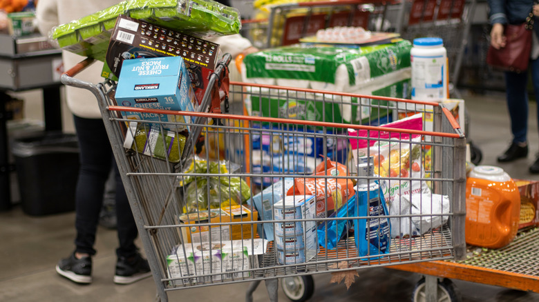 Loaded shopping cart at Costco checkout line