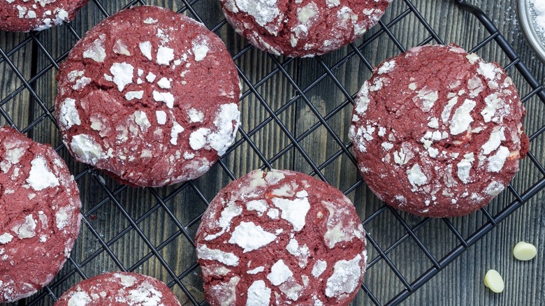 red velvet crinkle cookies on rack