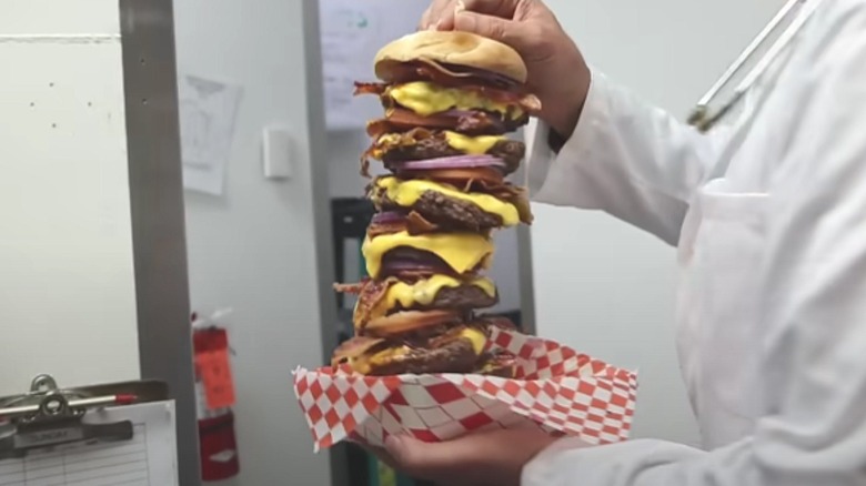 The octuple bypass burger at Heart Attack Grill has eight patties, bacon, chili and cheese