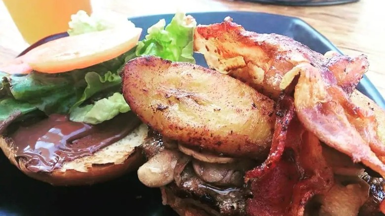 A deconstructed Muddy Pig burger on a plate