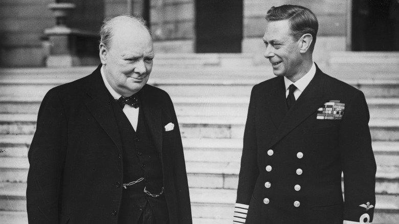 Churchill and King George VI standing together