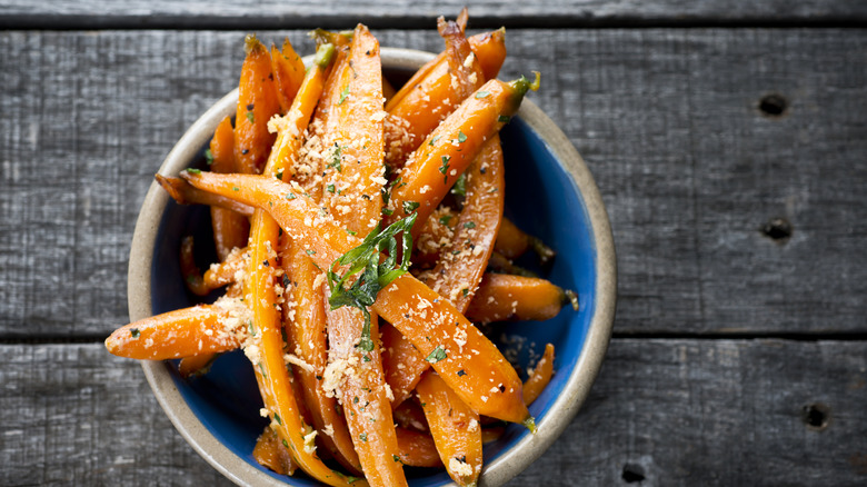 Roasted carrots dusted with Parmesan cheese and herbs.