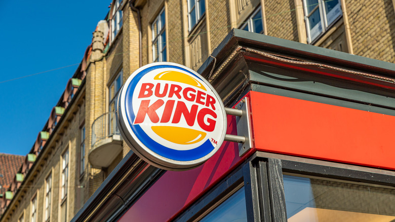 Burger King sign extends from the side of a building