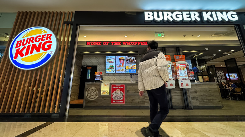 Customer walks into a Burger King restaurant