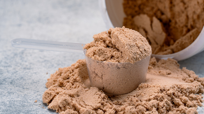 Protein powder with a scoop