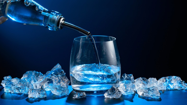 Pouring vodka into a glass