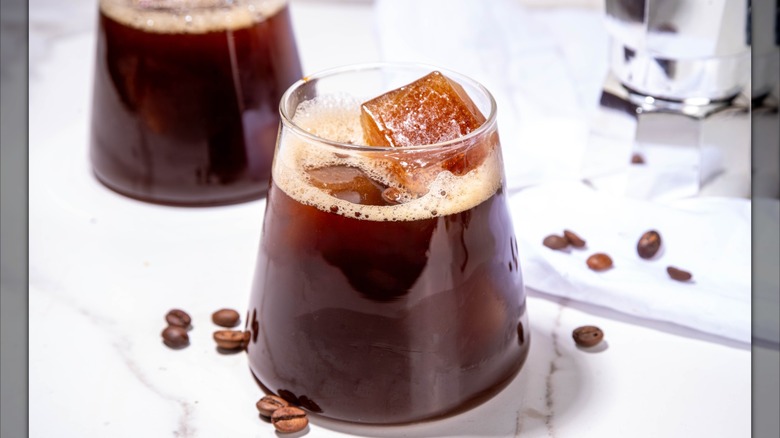 A coffee and vodka cocktail in a lowball glass