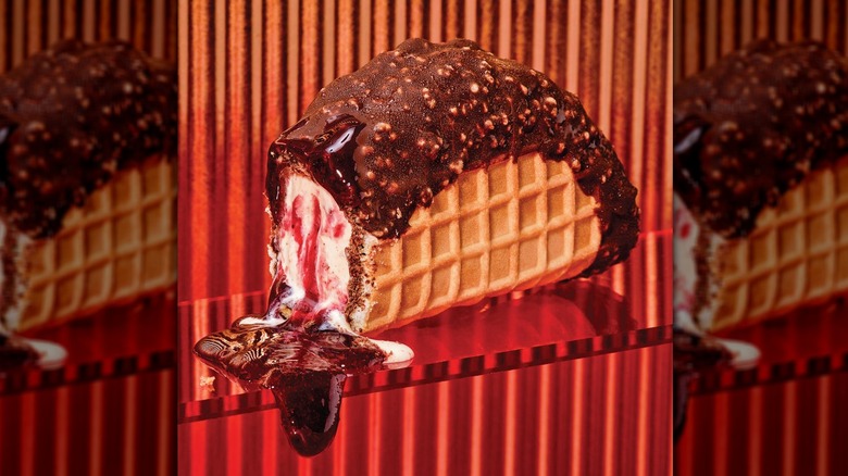 Tacolate with Wildberry Cinnamon sauce melting onto glass surface