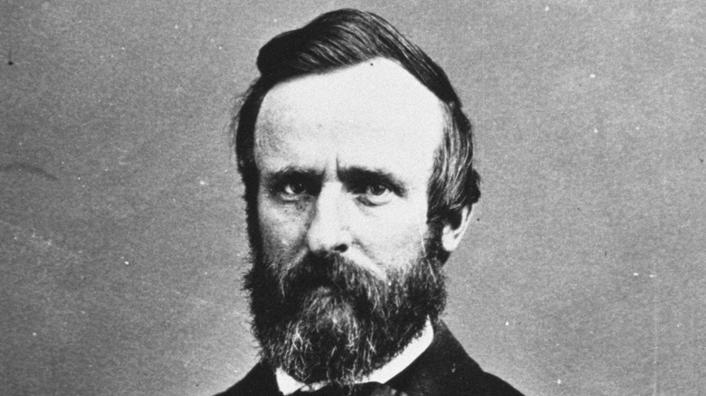 A black and white photograph of Rutherford B. Hayes