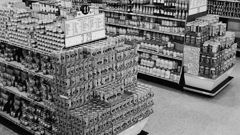 Black and white photo of supermarket shelves
