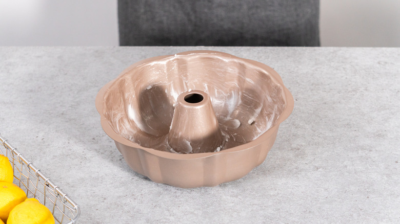 Butter greased baking pan