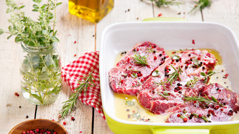steaks in oil marinade
