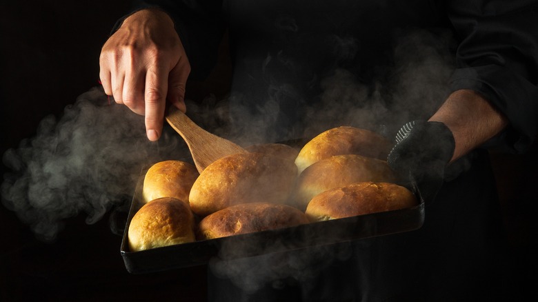 Buns in black baking sheet