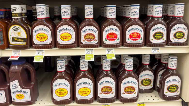 Grocery store shelf of Sweet Baby Ray's BBQ sauces