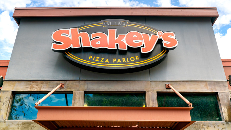 Exterior sign of a Shakey's pizza parlor