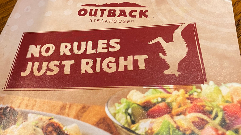 Front side of an Outback Steakhouse menu.