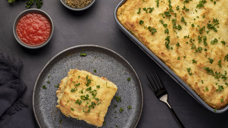 Square of casserole on a plate