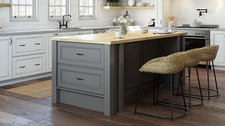 Butcher-block kitchen island with chairs