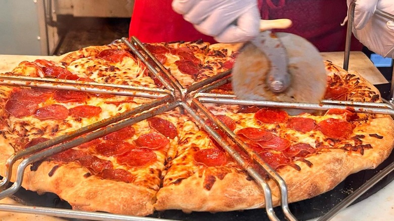 Costco food court pizza being sliced