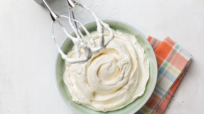 whipping heavy cream to emulsify it