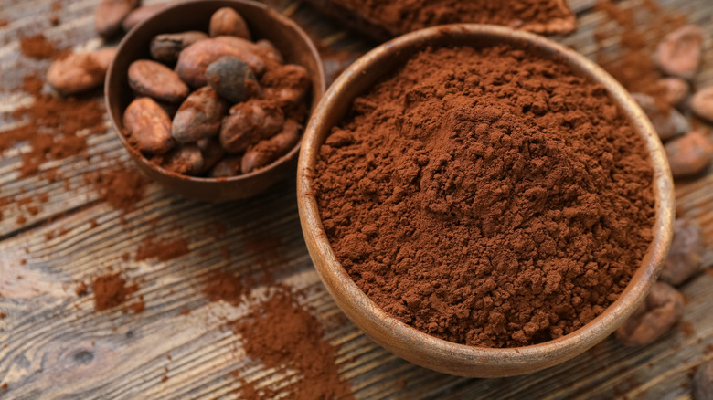 wooden bowl filled with cocoa powder