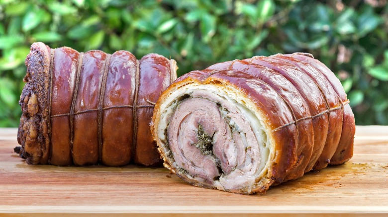 Roasted porchetta roll made with butterflied pork.
