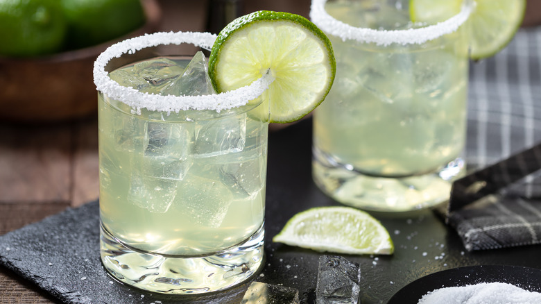 Margaritas on a stone tray.