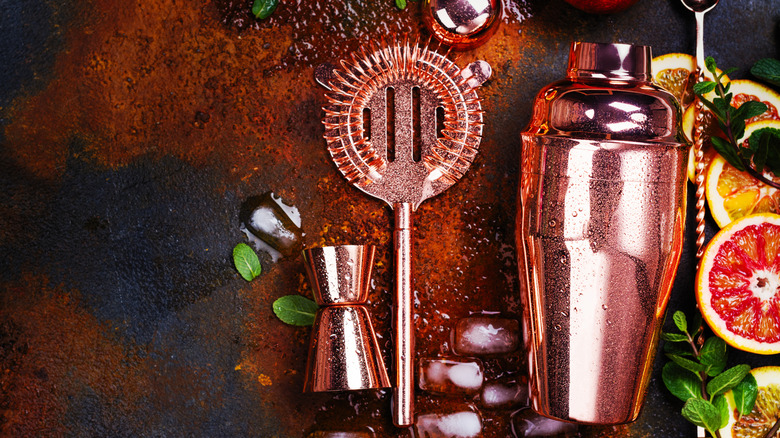 Cocktail tools with ingredients