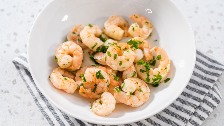 Shrimp scampi in white bowl