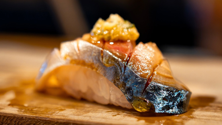 Tuna nigiri on a wooden board