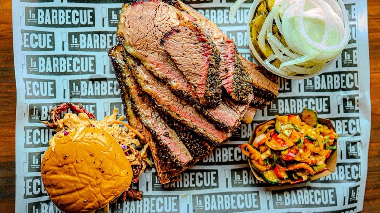 Platter of barbecue meats and sides