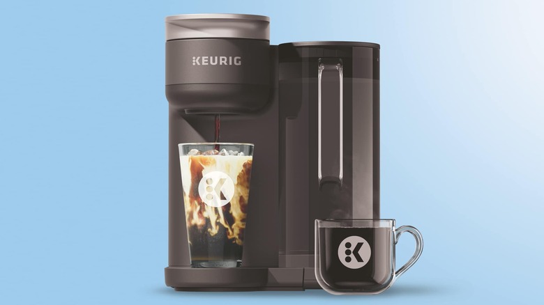 A Keurig coffee machine is brewing iced coffee