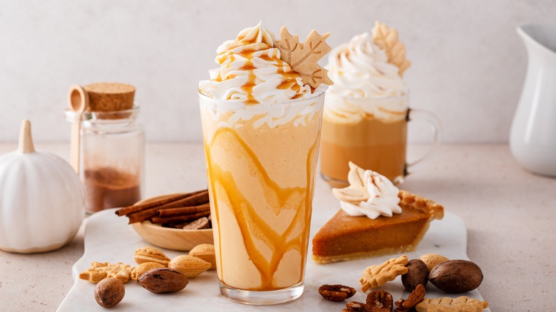 a pumpkin pie shake with whipped cream and caramel