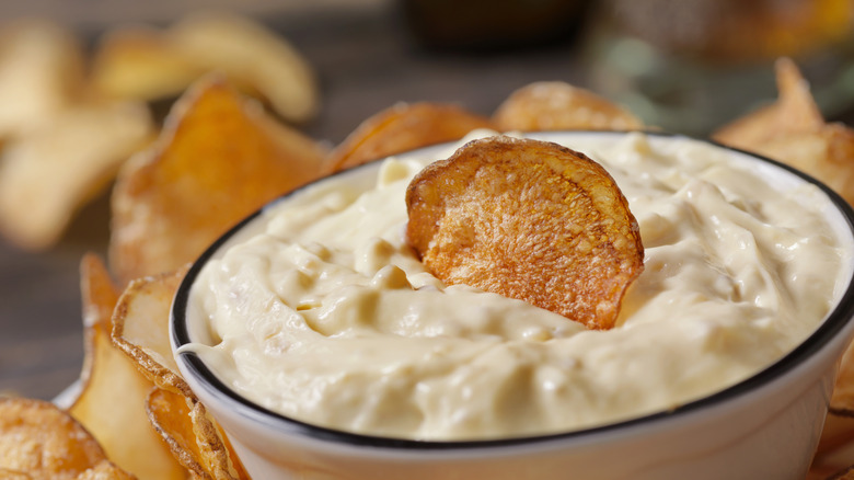 Bowl of onion dip with chips