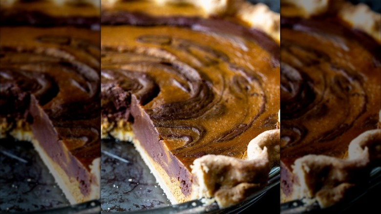 Slice of chocolate swirl pumpkin pie.