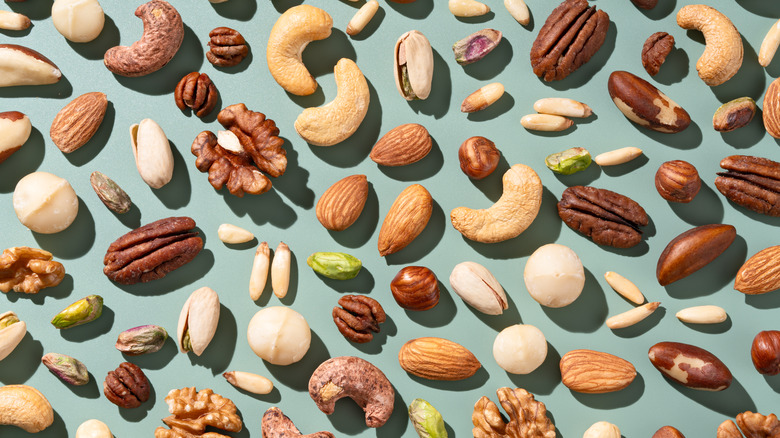 various nuts blue background