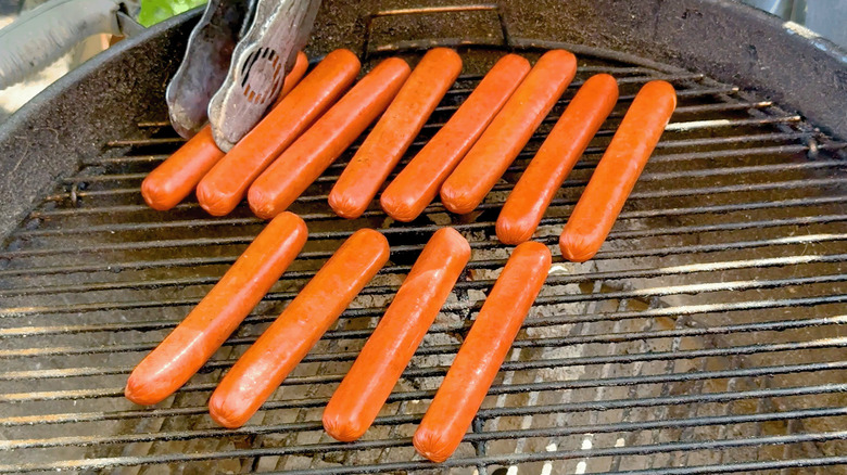 Hot dogs on a grill