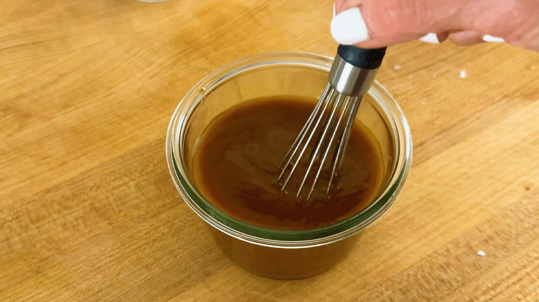 Mini whisk in brown sauce