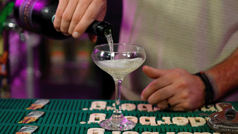 pouring champagne