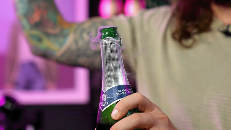 opening champagne bottle