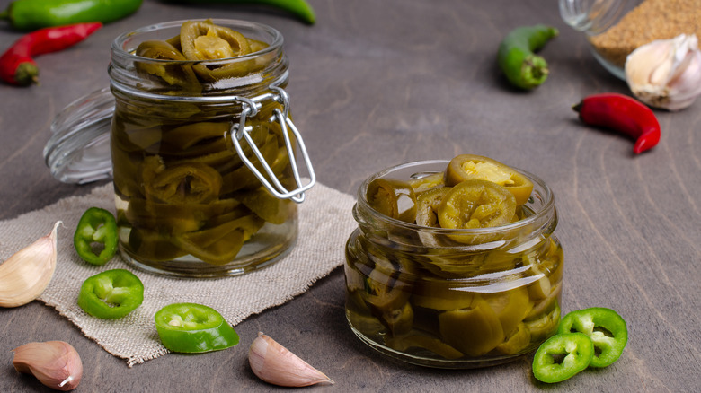 Two jars of pickled jalapeños