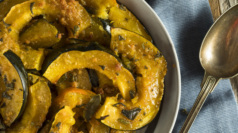 roasted acorn squash sliced in a bowl