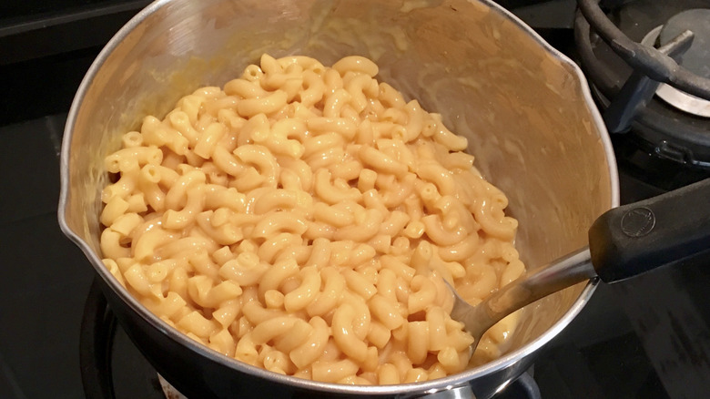 cooking mac and cheese on the stove