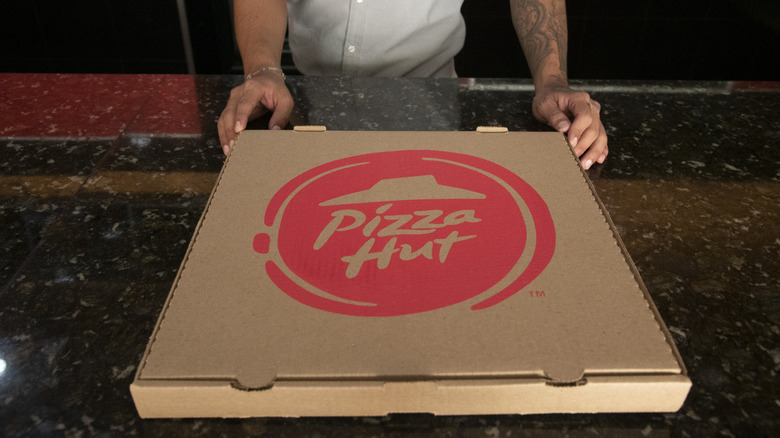 Pizza Hut box on counter