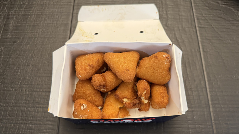 Fried cheesecake bites in a box