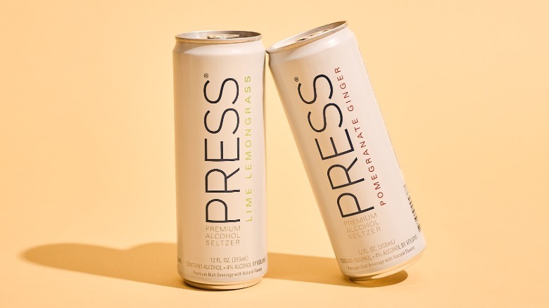 Press hard seltzers on a table