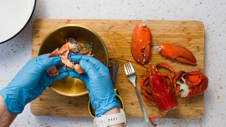 Pulling out the knuckle meat