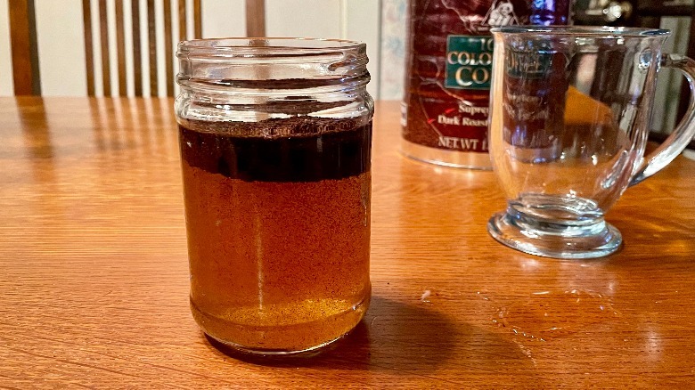 Coffee grounds floating in water